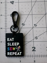 Load image into Gallery viewer, Color Printed Bag Charms - Eat Sleep Sew Repeat - Black Acrylic

